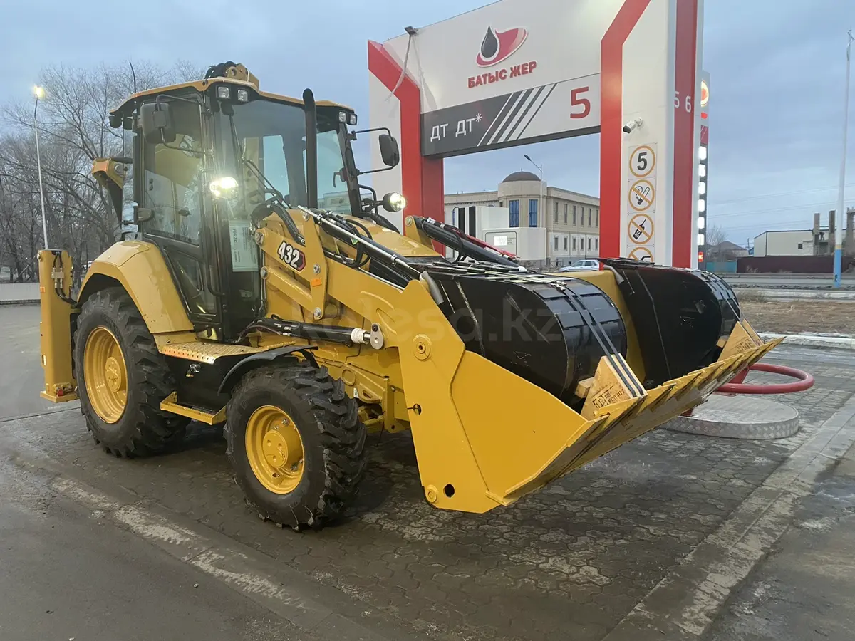Экскаватор-погрузчик САТ - фото 3