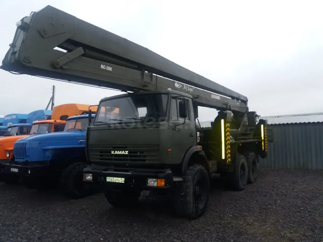 Экскаватор-погрузчик САТ - фото 5