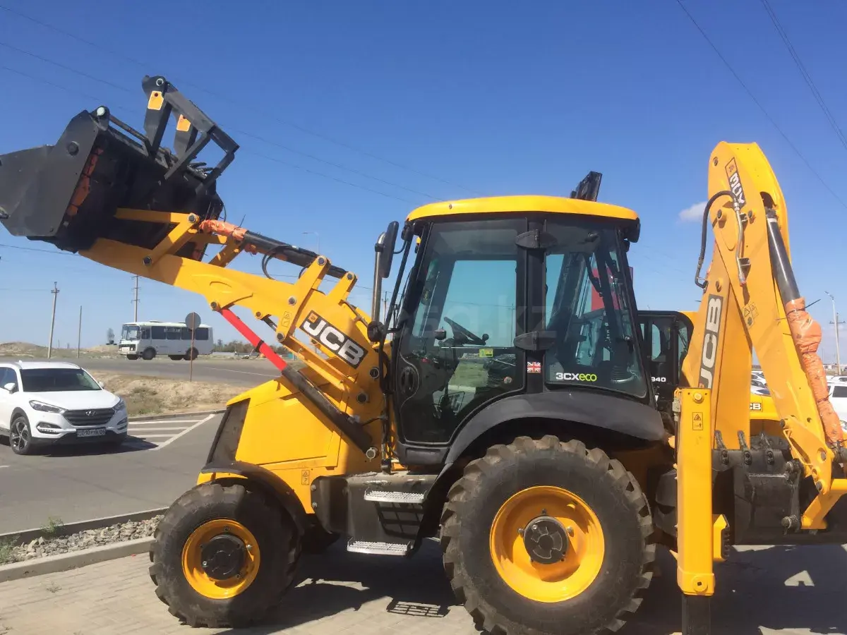 Экскаватор-погрузчик - фото 3